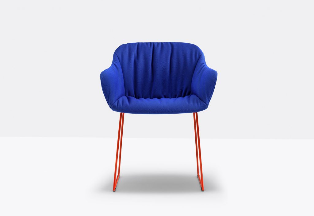 blue fabric covered armchair with orange steel rod frame
